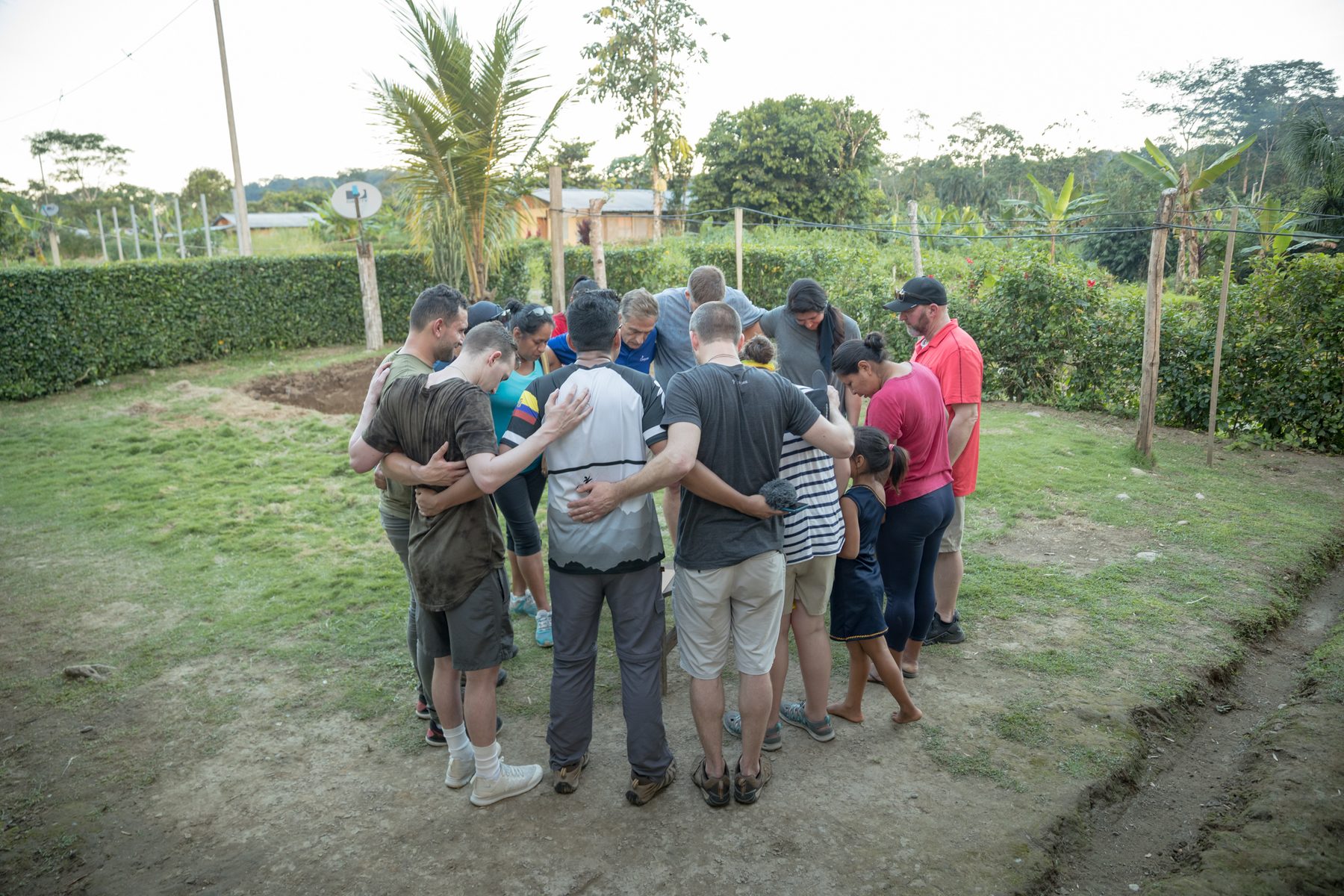 Mission team praying together